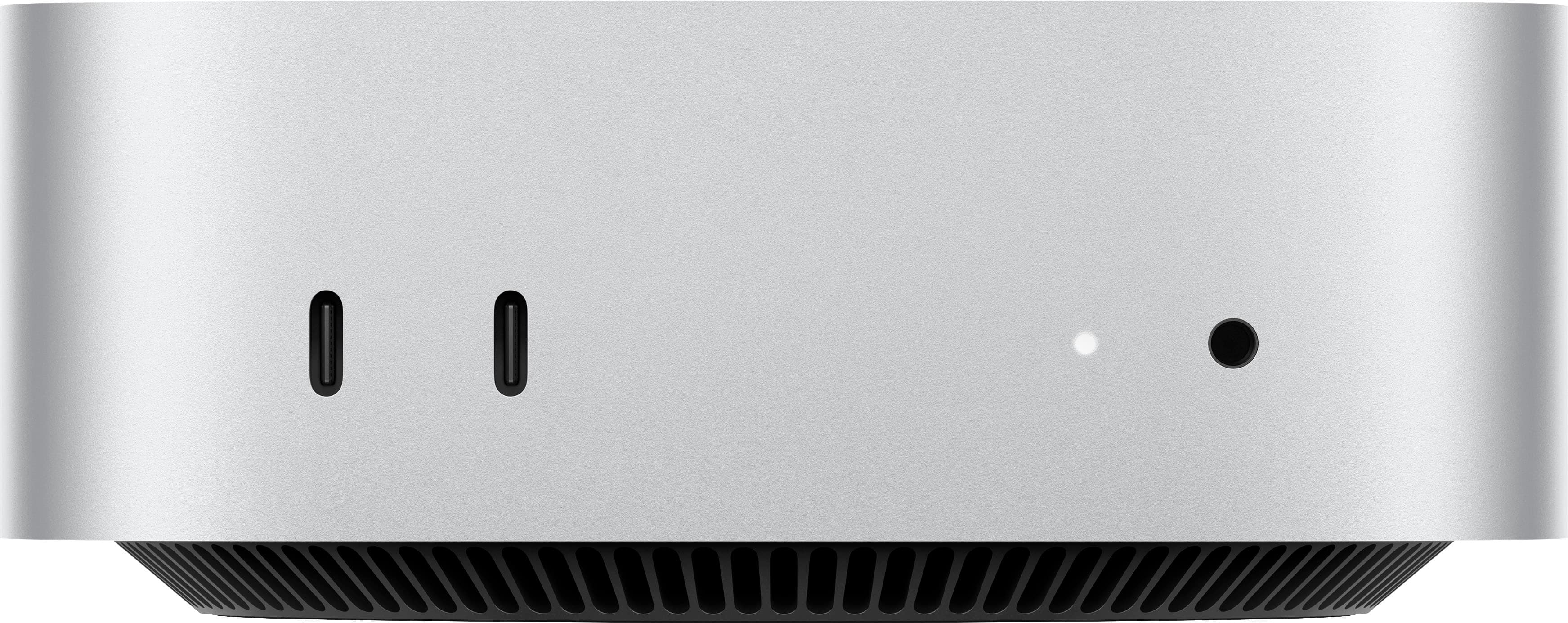 Apple Mac mini M4 on a modern desk with peripherals